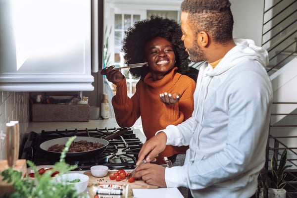 couple cooking in a kitchen